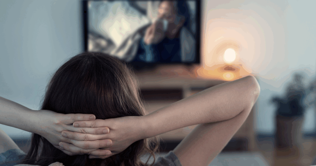 relaxed woman watching tv