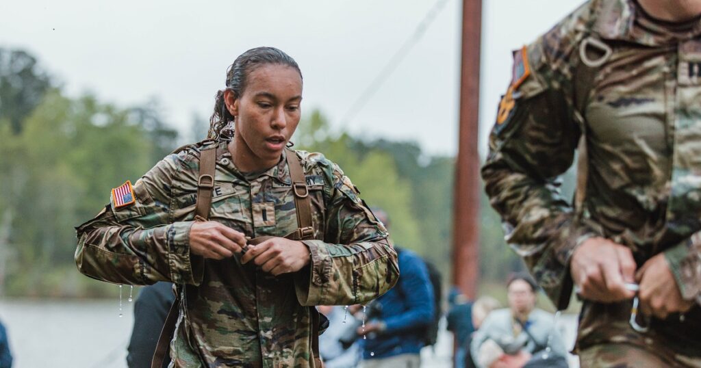1Lt. Gabrielle White competes in the 2025 Best Ranger Competition during the “Run-Swim-Run” event