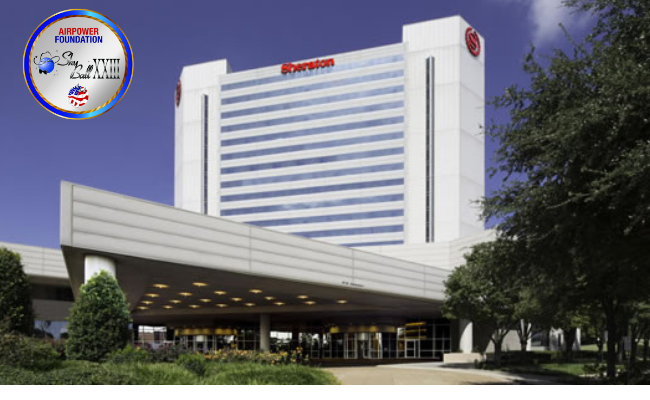 Sheraton Hotel image with backdrop of greenery