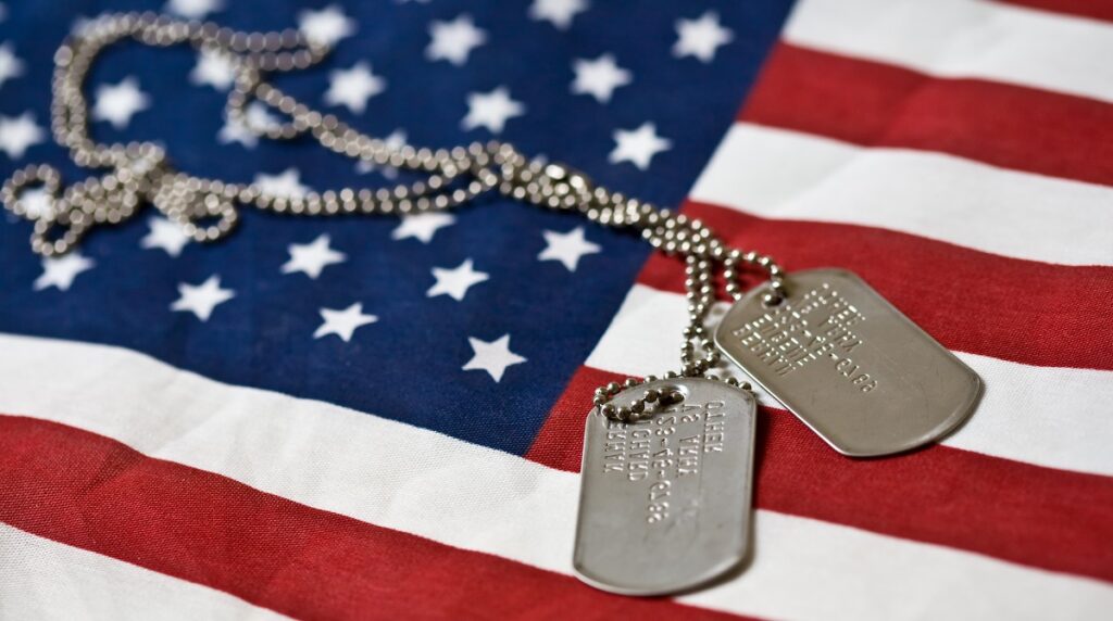 Pair of dog tags on american flag
